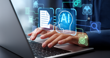 Homme sur son ordi utilisant l'Intelligence Artificielle